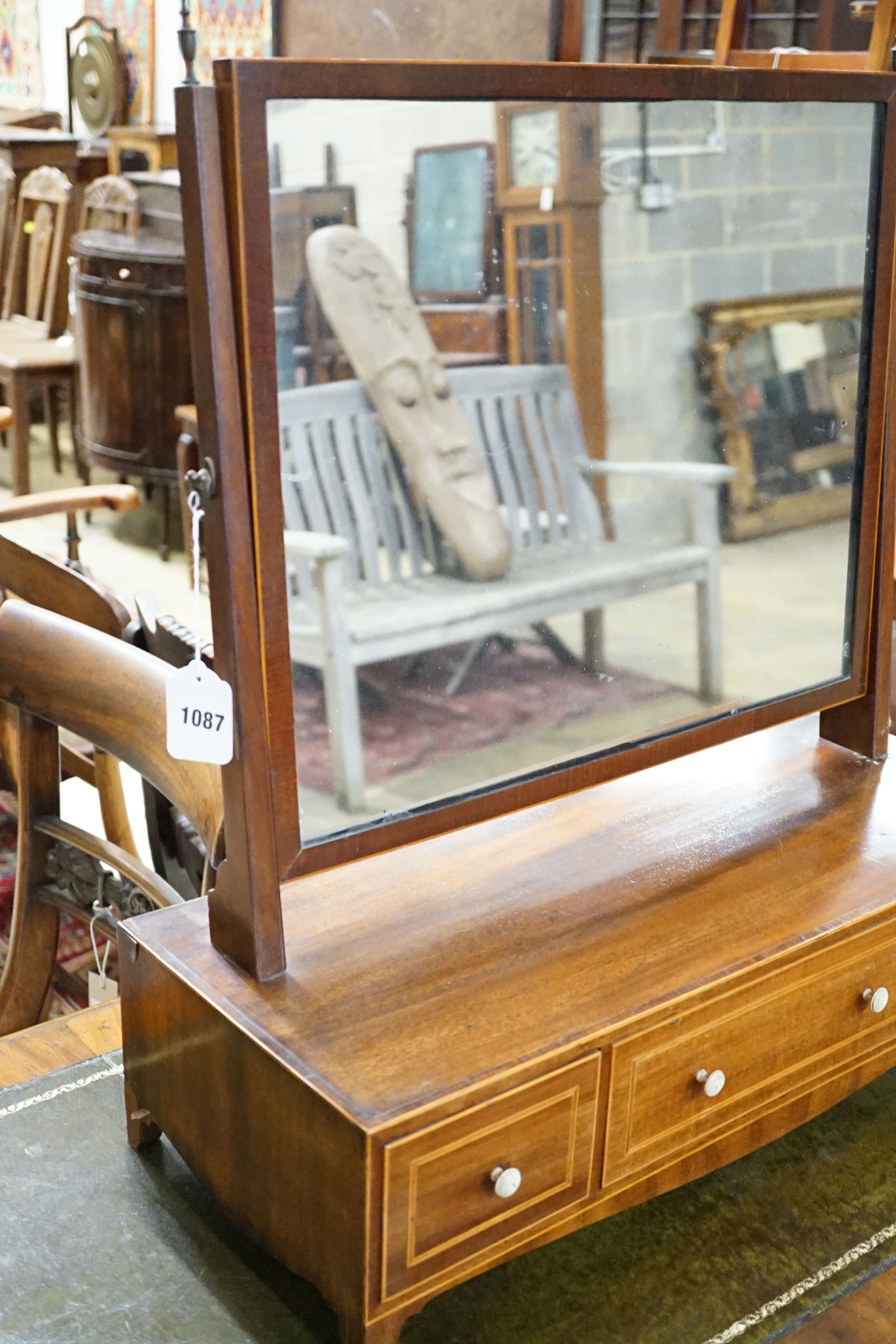 A Regency boxwood strung mahogany toilet mirror, width 62cm